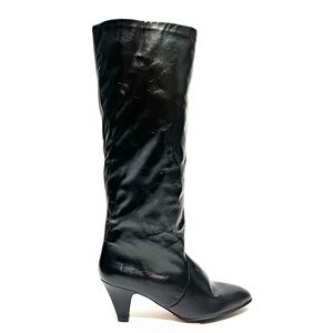 Vintage 1970s deadstock black leather zip up fleece lined heeled winter boots